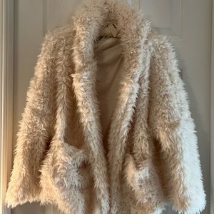Fluffy white coat. Worn once, size large. Like new!